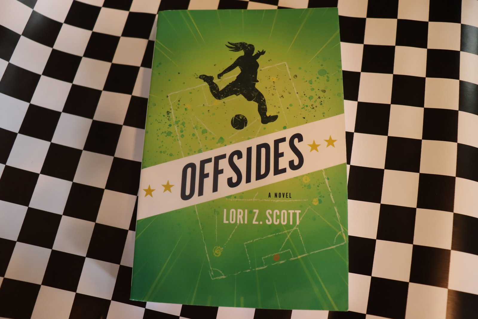 Offsides by Lori Z. Scott: A Book Review by Kathryn Dover