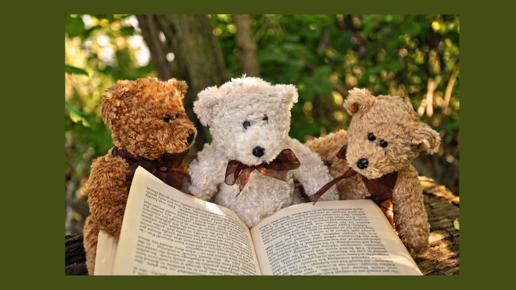 Three teddy bears reading a kids' book